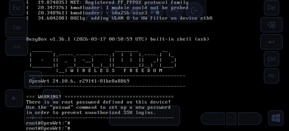 OpenWrt terminal with the SPICE keyboard and pointer overlay